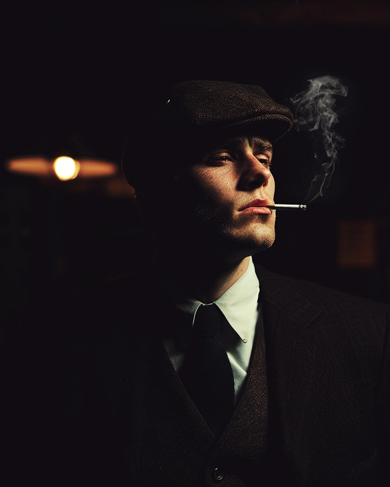 Gangster actor with cigarette structure smoke